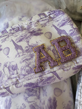 Beautiful purple toile print pouch