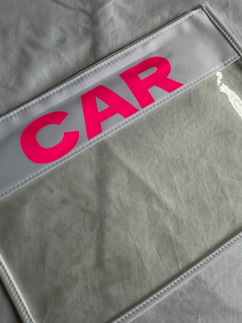 Clear white pouch with neon pink CAR