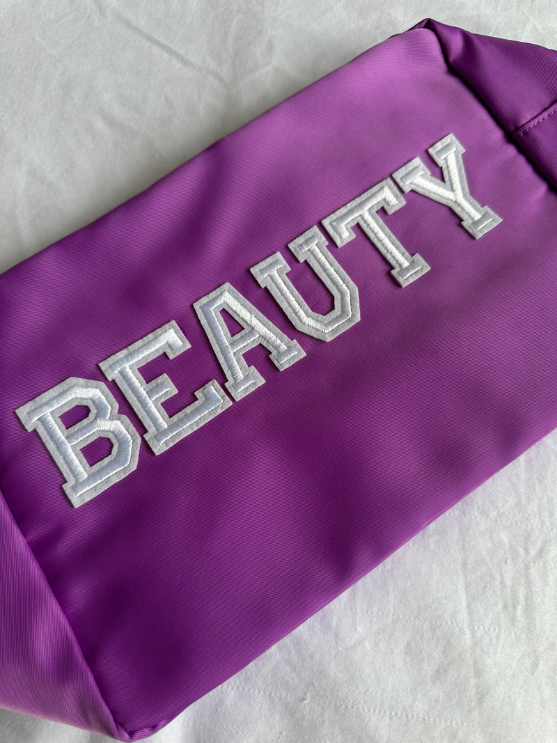 XL purple pouch with BEAUTY silk letters