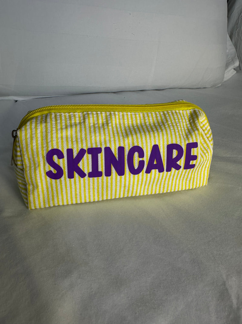 Yellow Pouch with Purple SKINCARE